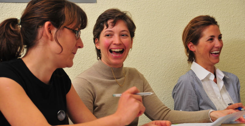 Girls receiving a Spanish course for business